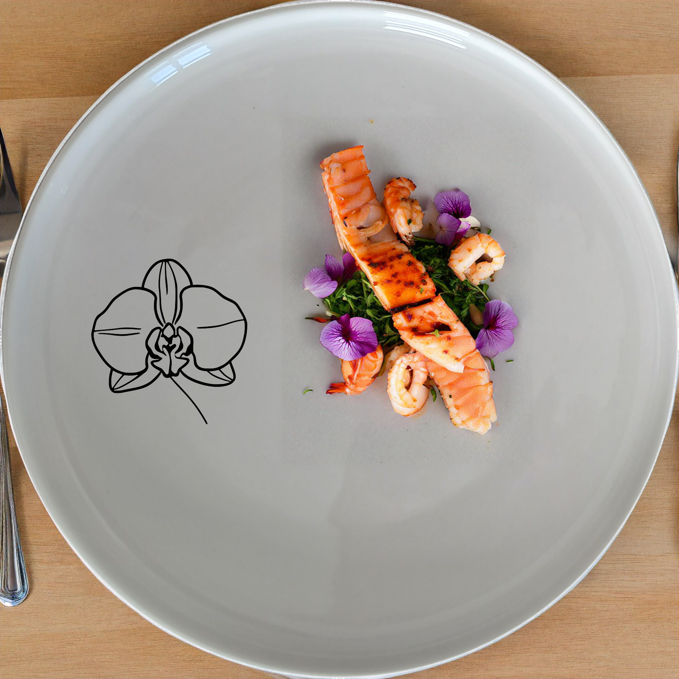 The Orchid Side Plate Set 3 features a delicate laser-etched orchid design on a smooth white ceramic surface, perfect for adding a touch of sophistication to any meal.