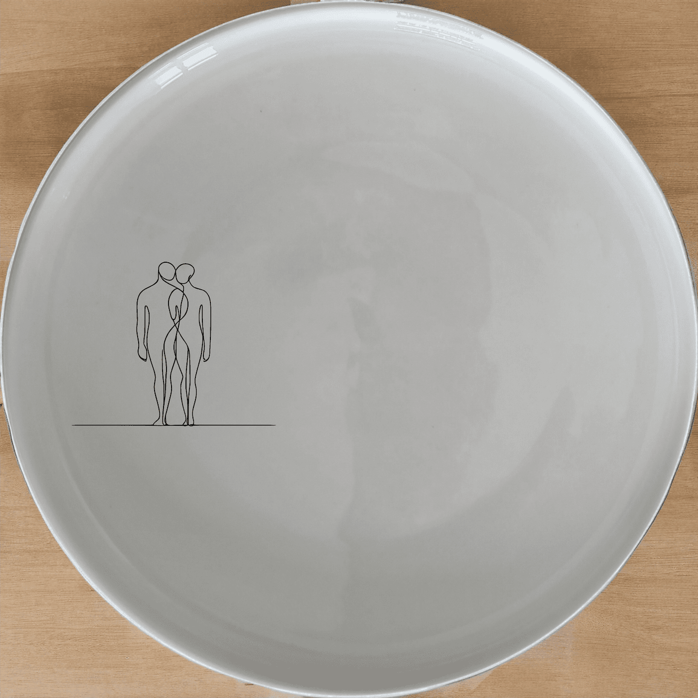 Elongated Human Figures Dinner Plate Set of 4 - Range 2 is a modern, artistic dinnerware set that adds a touch of contemporary design to any dining table.