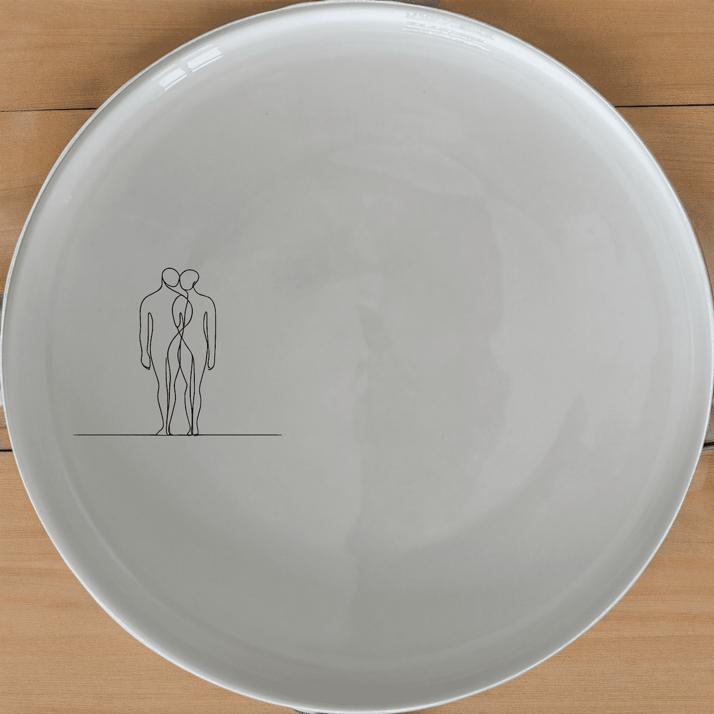 Elongated Human Figures Side Plate Set of 4 - Range 2 is a modern and artistic dinnerware set that adds a touch of contemporary design to your dining table.