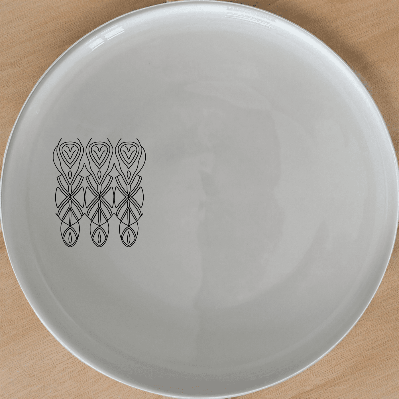 The African Geometric Tribal Pattern Design Dinner Plate Set of 4 features a striking black and white geometric design, perfect for modern dining.
