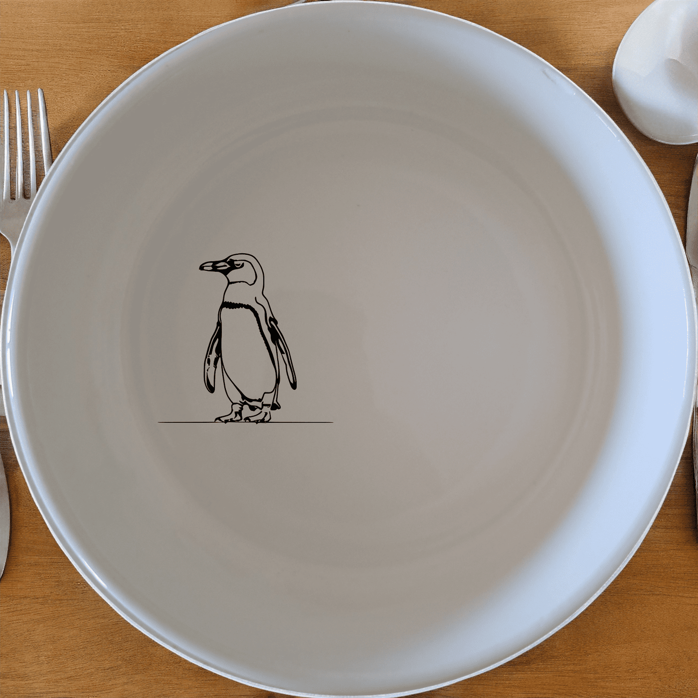 The African Penguin Silhouettes Bowl Set of 4 features elegant penguin silhouettes on white ceramic bowls, perfect for adding a touch of nature to your dining experience.
