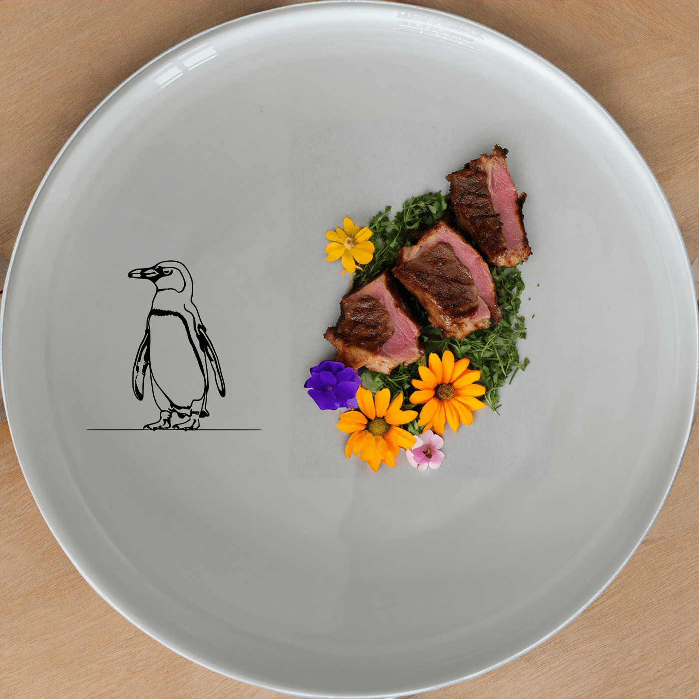 African Penguin Dinner Plate Set of 4 features minimalist penguin silhouettes for a modern, artistic touch to your dining experience.