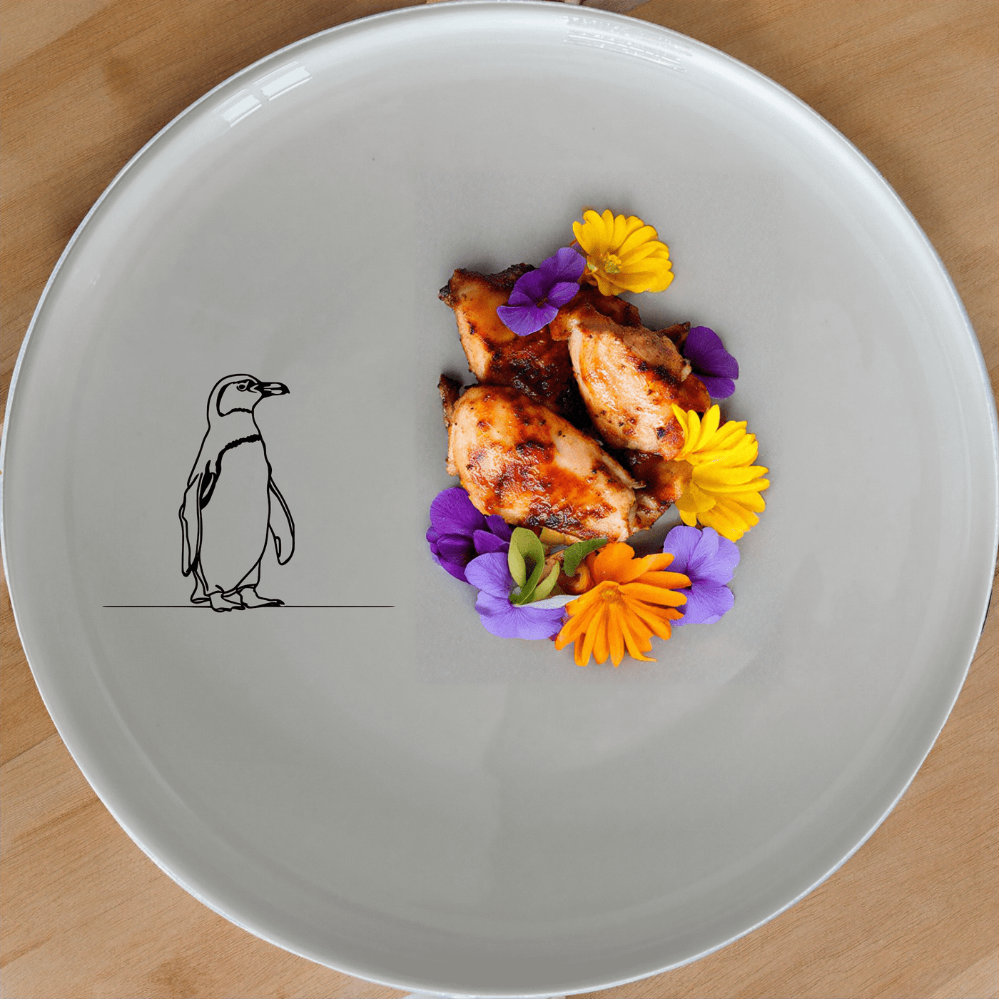 The African Penguin Dinner Plate Set of 4 features minimalist penguin silhouettes, perfect for modern dining and everyday use.