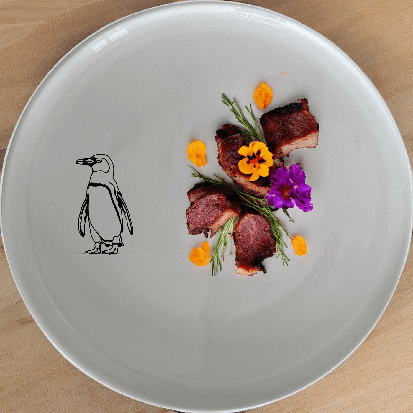 African Penguin Side Plate Set of 4 offers a charming silhouette design perfect for modern dining. Crafted from durable ceramic, these plates are microwave and dishwasher safe, making them ideal for everyday use.