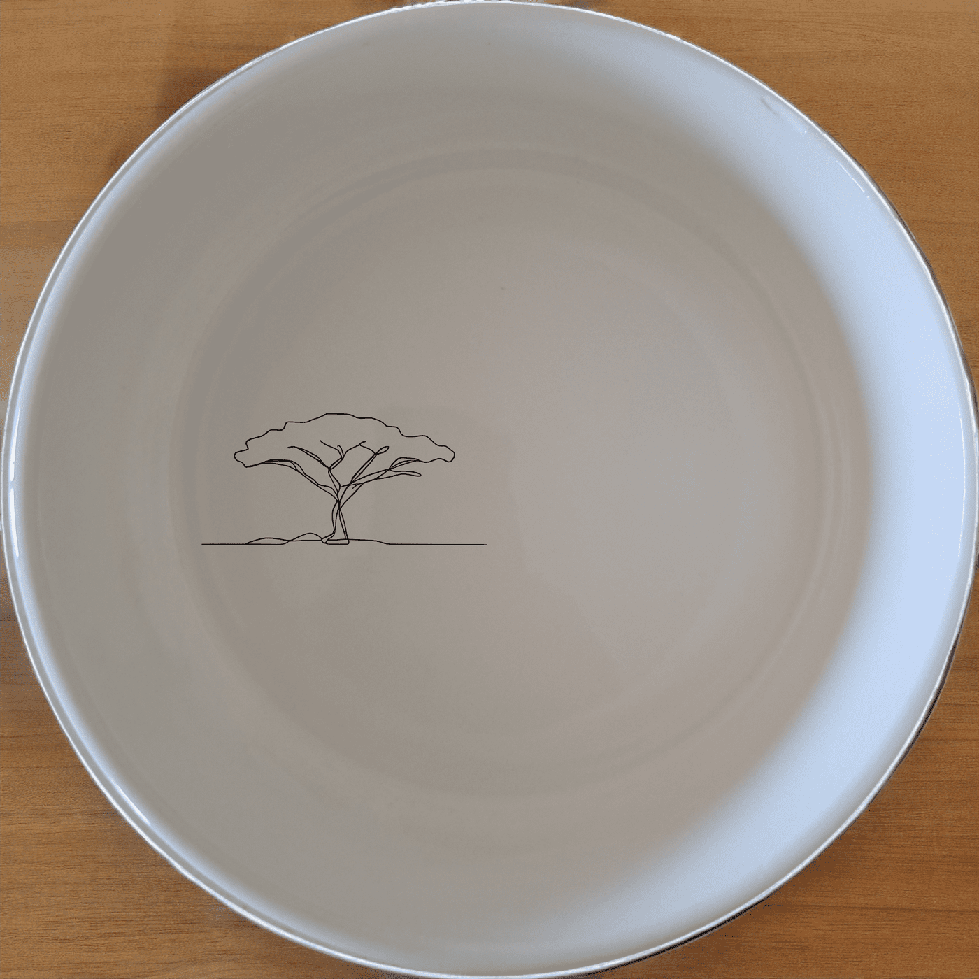 The African Sunset Savanna Acacia Tree Bowl Set of 4 brings a touch of nature to your dining table with its elegant design.