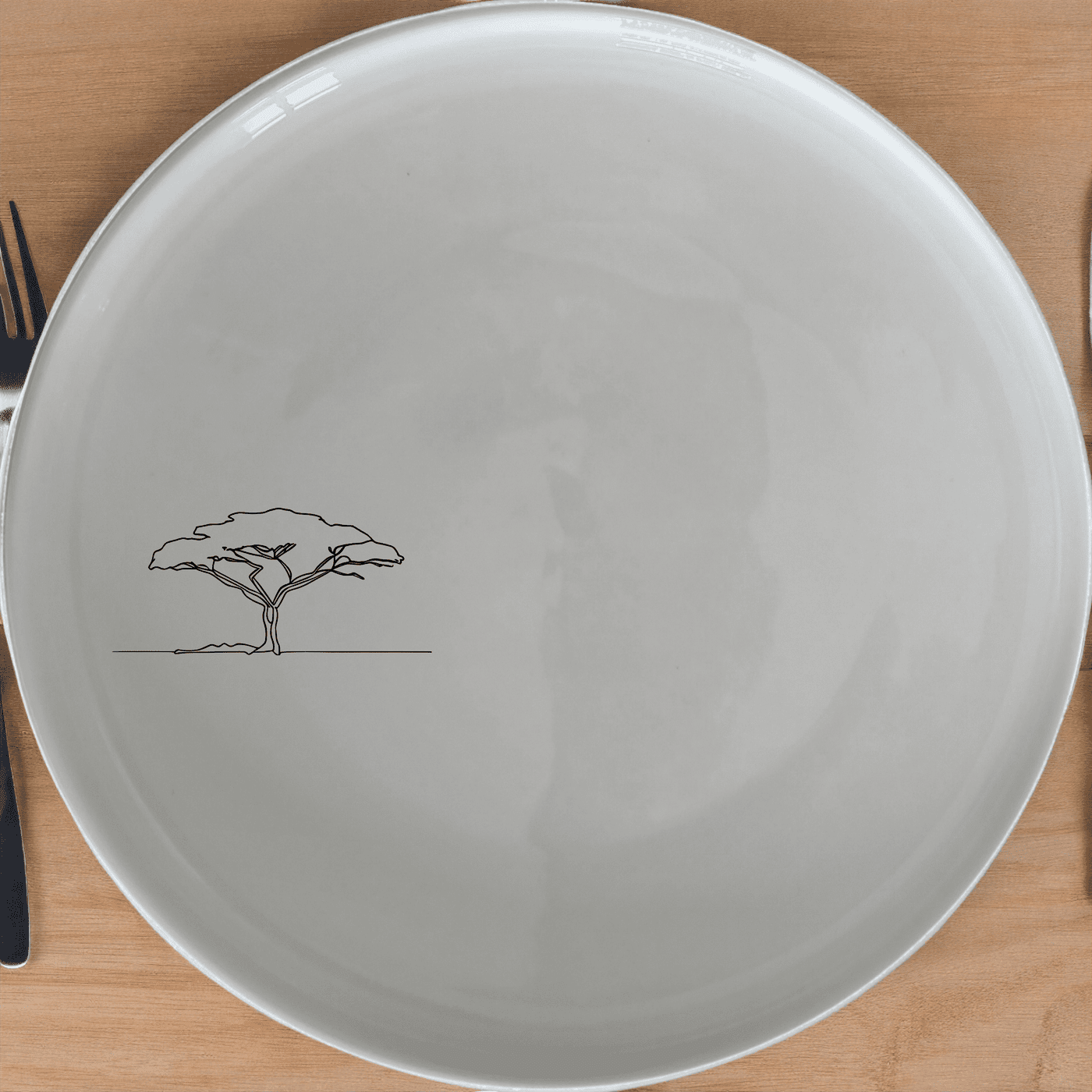 The African Sunset Savanna Acacia Tree Dinner Plate Set of 4 features a minimalist design perfect for modern dining. Crafted from durable ceramic, these plates are microwave and dishwasher safe, making them ideal for everyday use.
