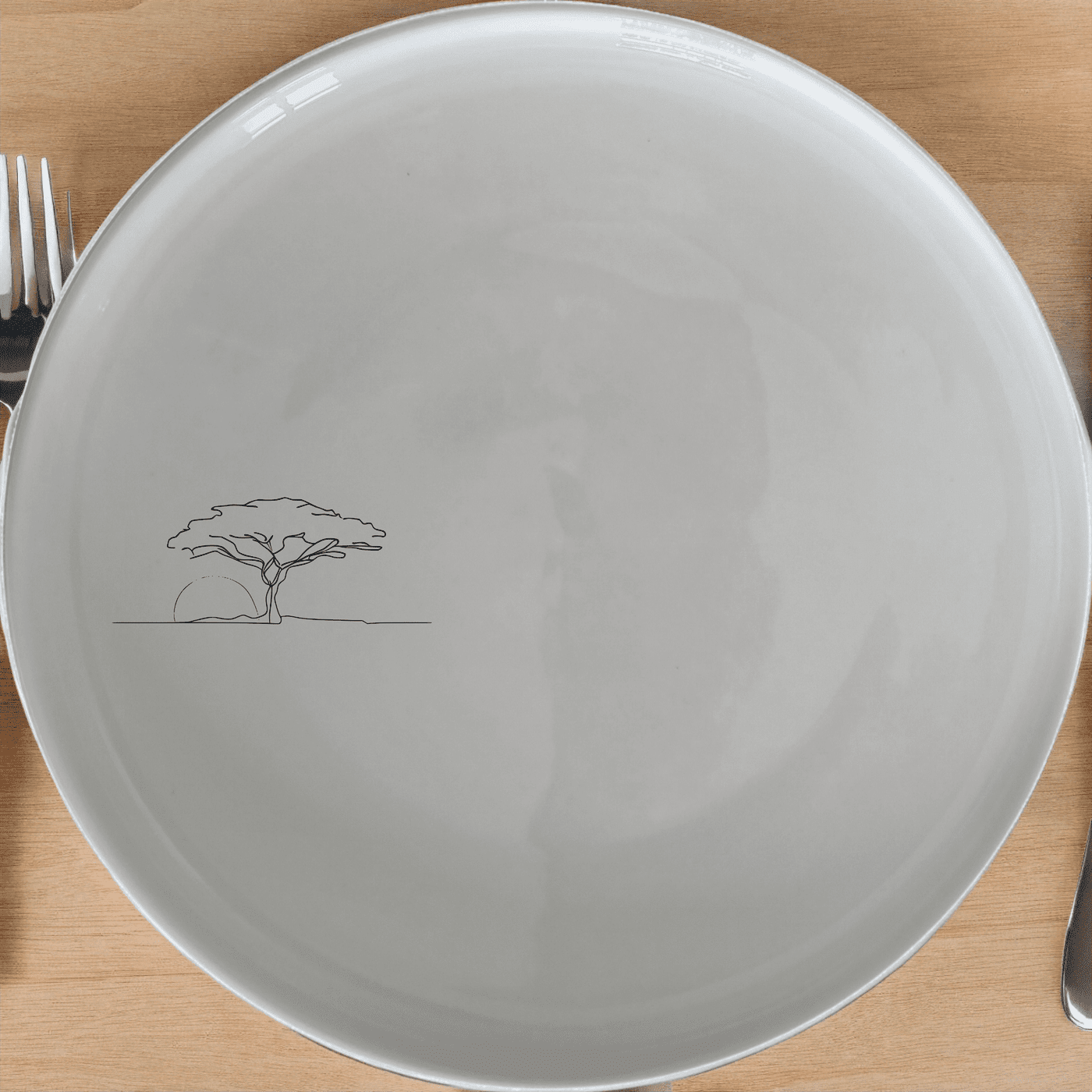 African Sunset Savanna Side Plate Set of 4 features a serene sunset scene with an acacia tree, perfect for adding a touch of nature to your dining table.