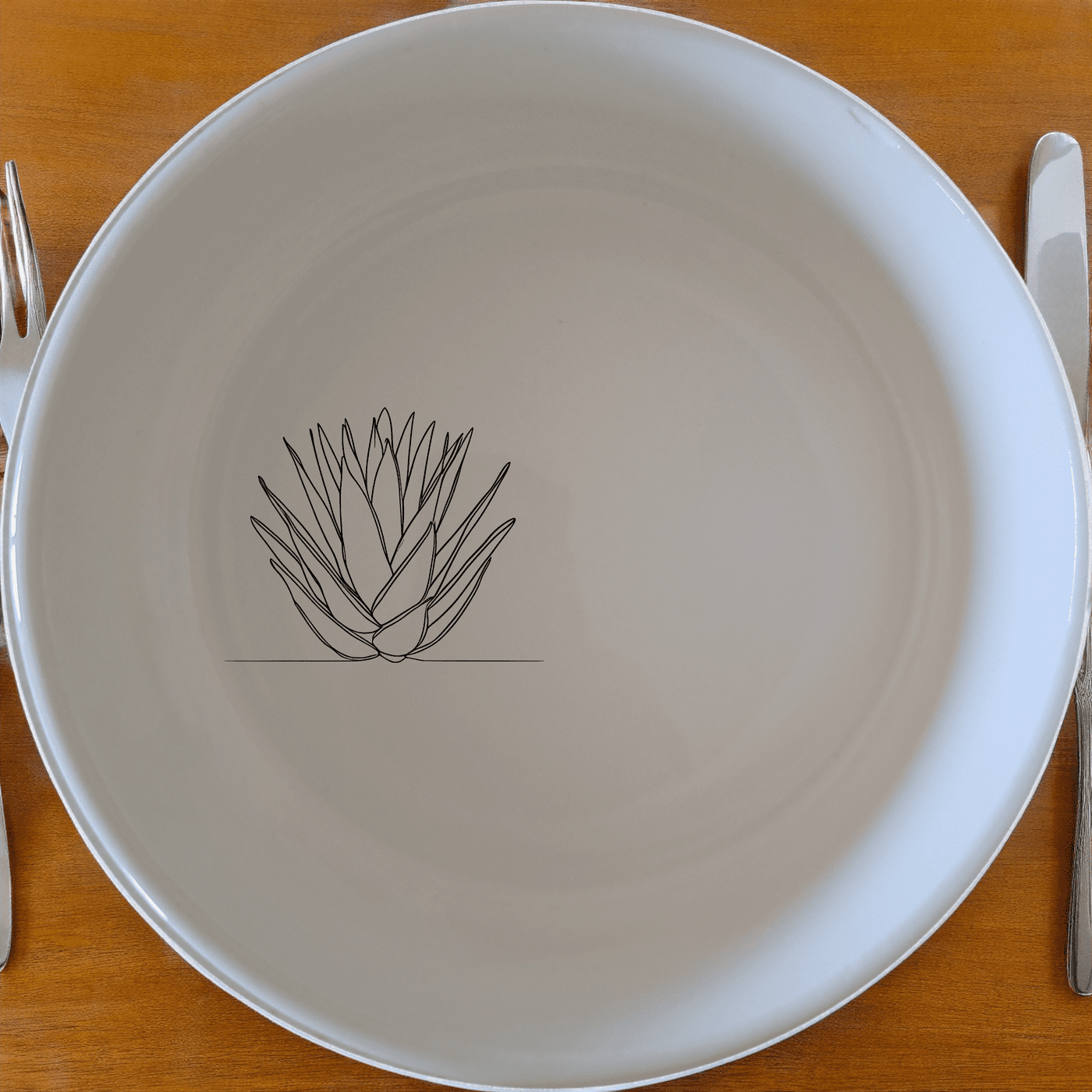 The Aloe Ferox Flower Spike Bowl Set of 4 features a minimalist design with a subtle botanical illustration, perfect for modern dining and everyday use.