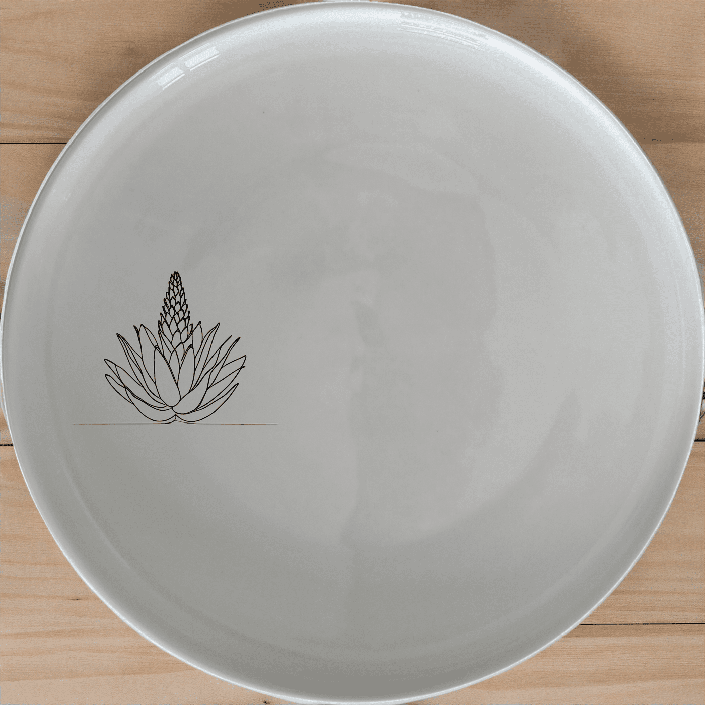 The Aloe Ferox Flower Spike Dinner Plate Set of 4 features a minimalist design with an elegant aloe flower illustration, perfect for modern dining.