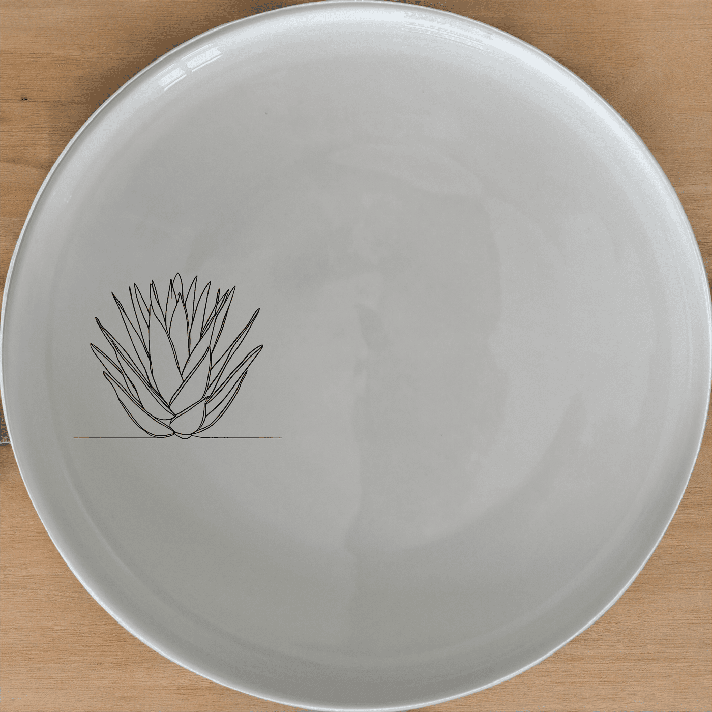 The Aloe Ferox Flower Spike Side Plate Set of 4 adds a touch of nature to your dining table with its elegant design.