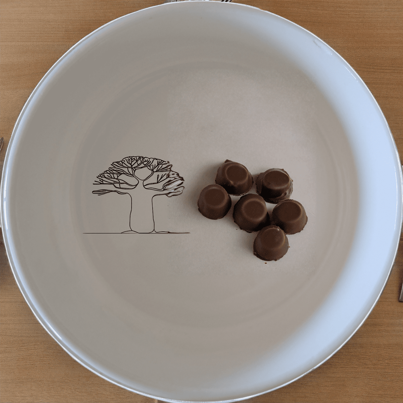 Baobab Tree Silhouette Sunset Bowl Set of 4 is a stunning set of four ceramic bowls featuring a unique baobab tree silhouette design. Perfect for any occasion, these bowls add a touch of elegance to your dining experience.