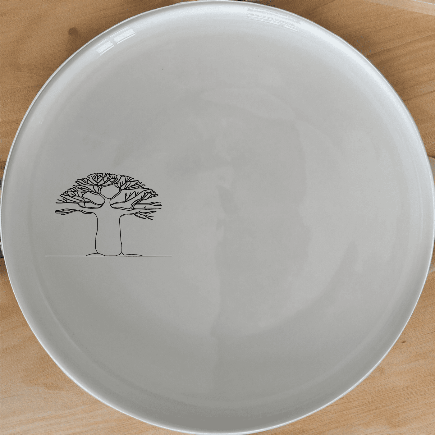 Baobab Tree Silhouette Side Plate Set of 4 adds a touch of nature to your dining table with its elegant design.