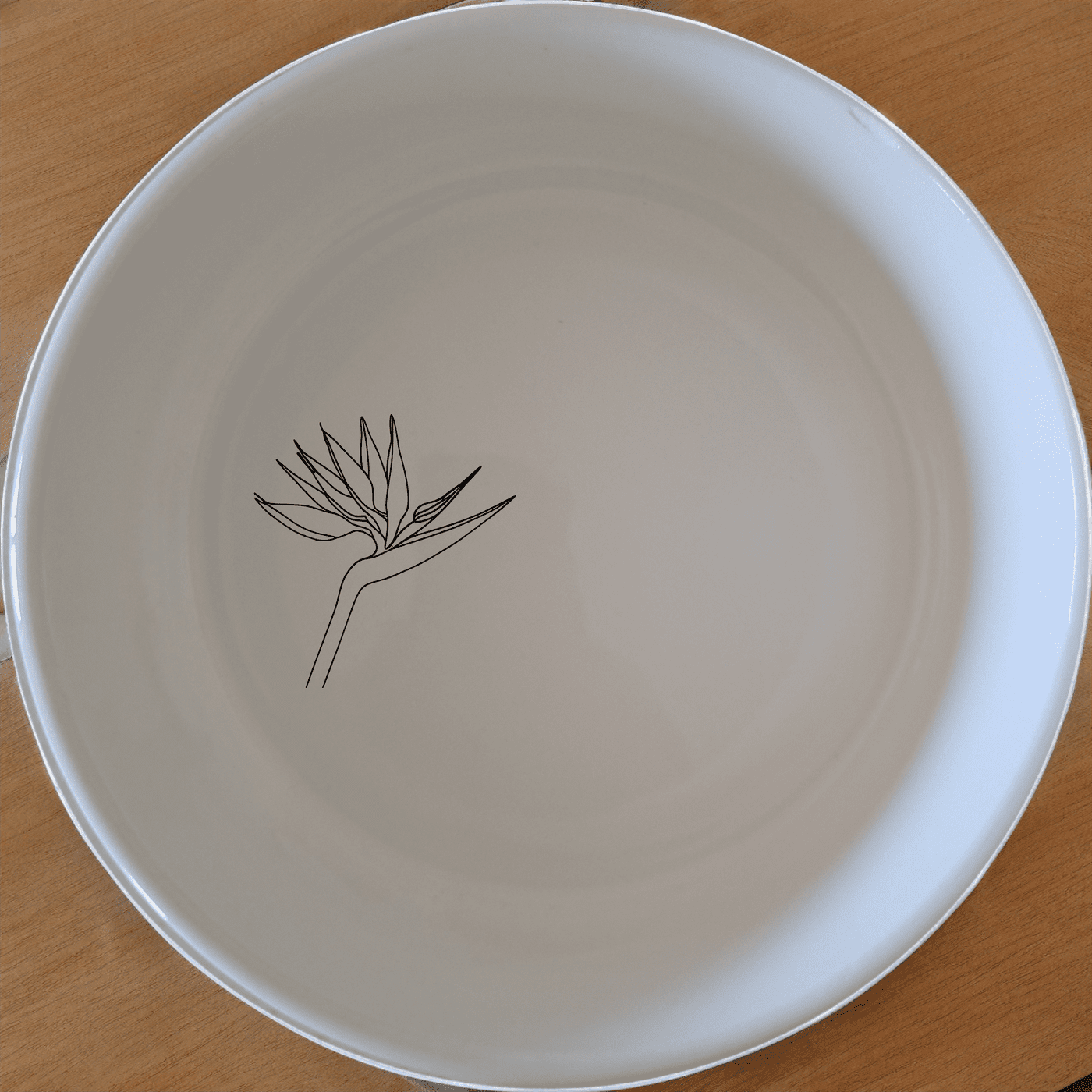The Bird of Paradise Bowl Set of 4 features delicate bird illustrations, perfect for adding a touch of nature to your dining experience.