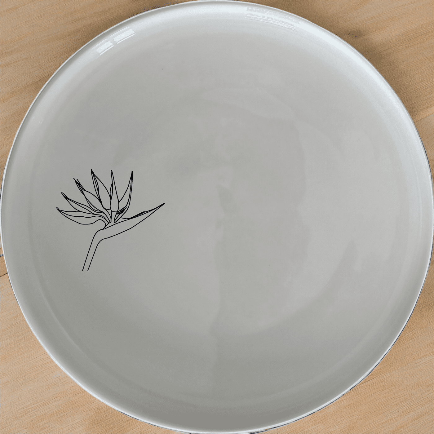 Bird of Paradise Dinner Plate Set of 4 features elegant laser-etched designs perfect for any dining occasion.