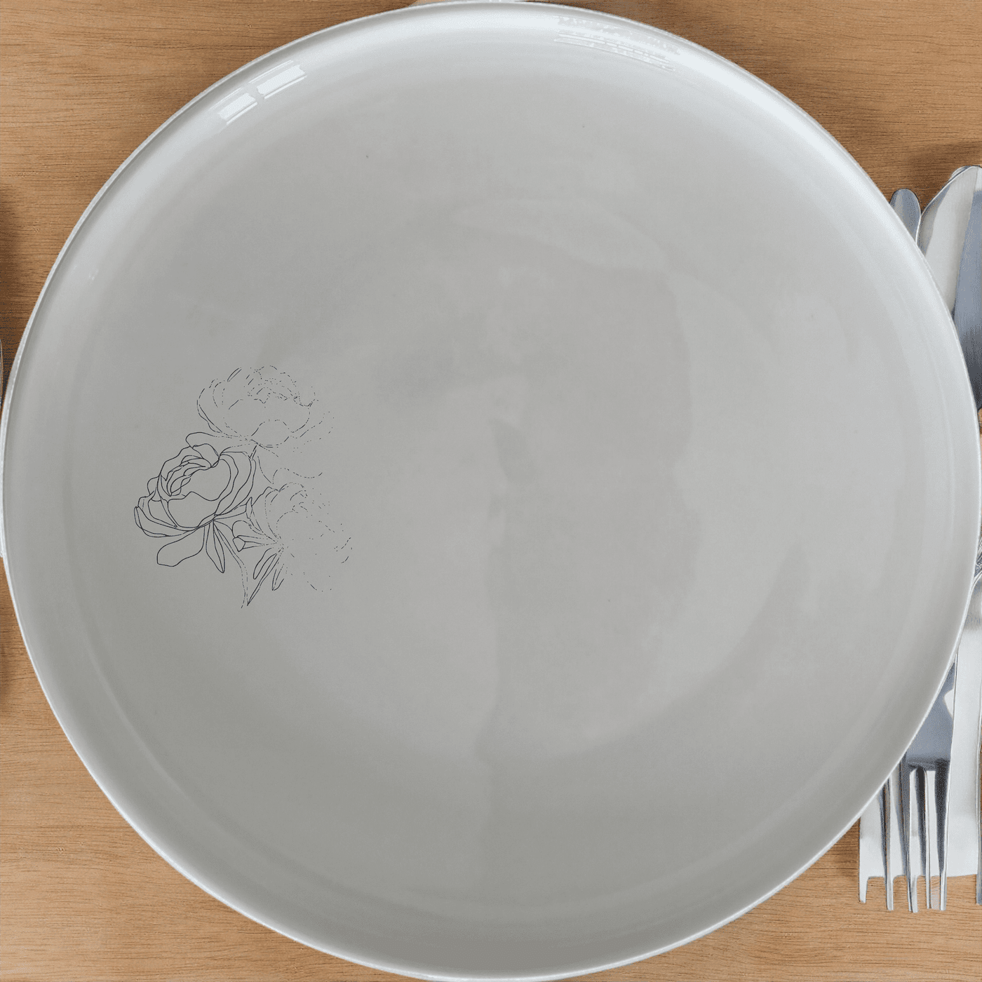 The Bold Coral Peonies Dinner Plate Set of 4 adds a touch of elegance to your dining table with its intricate floral design.