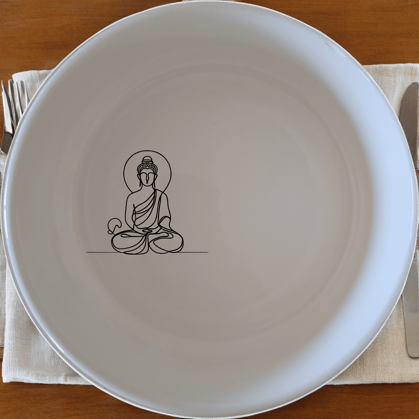 Budist Imagery Bowl Set of 4 is a beautifully designed set of four white ceramic bowls, each featuring a serene Buddha figure in a meditative pose, perfect for adding a touch of tranquility to your dining experience.