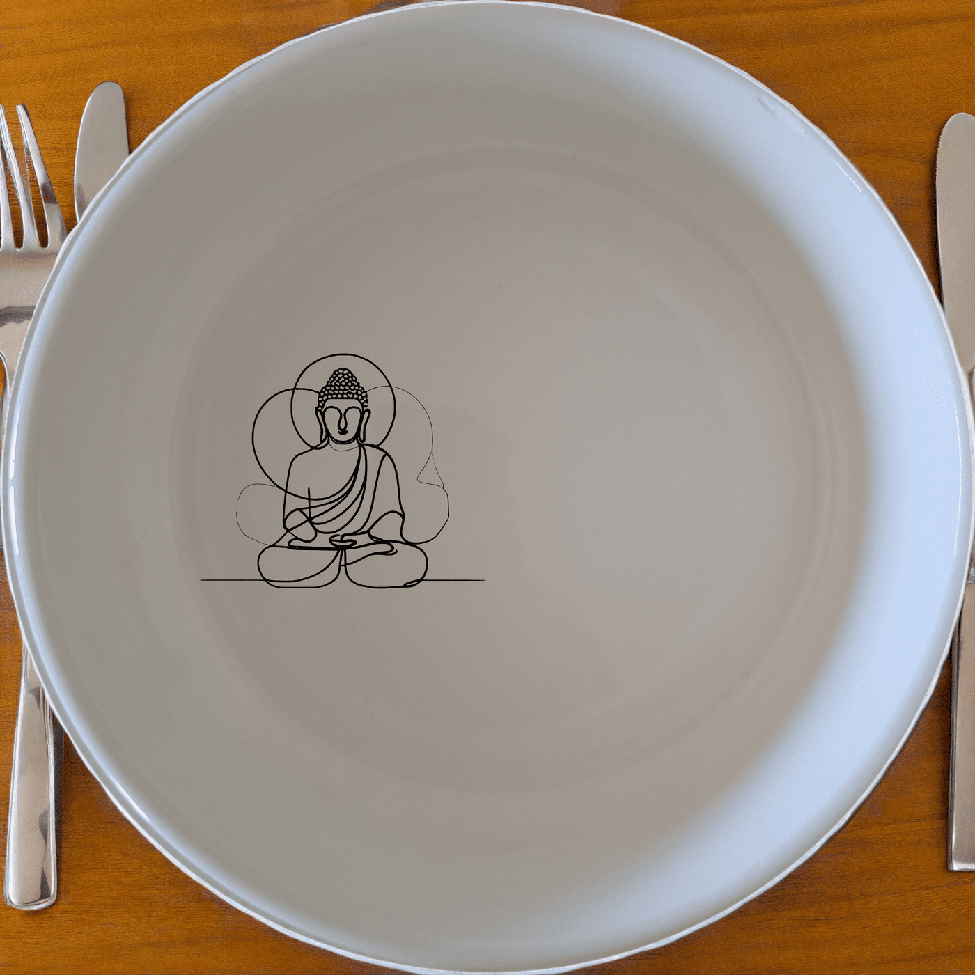 Budist Imagery Bowl Set of 4 offers a serene and minimalist design perfect for any dining table. This set of four white ceramic bowls features a subtle, laser-etched Buddha silhouette, bringing a touch of tranquility and elegance to your meals.