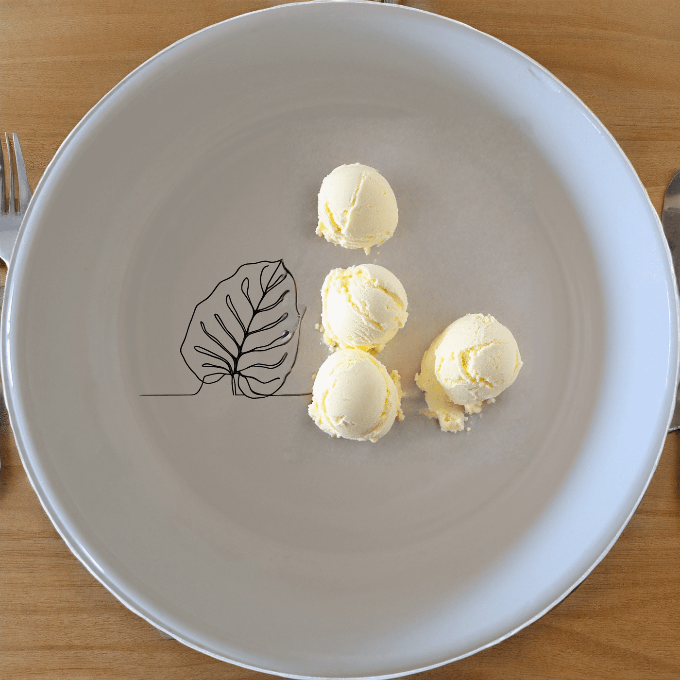 The Calathea Orbifolia Bowl Set of 4 features a minimalist design with a subtle leaf motif, perfect for modern and nature-inspired kitchens.