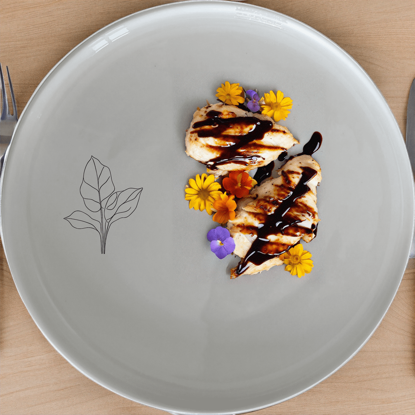 The Calathea Orbifolia Dinner Plate Set of 4 features a delicate leaf design, perfect for modern dining and everyday use.