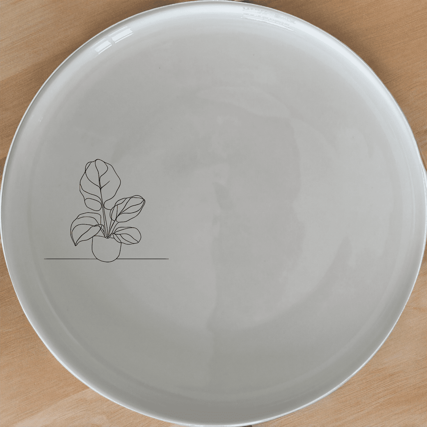 The Orbifolia Leaf Dinner Plate Set of 4 adds a touch of nature to your dining table with its elegant leaf design.