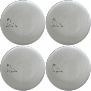 The Cape Fur Seal Side Plate Set of 4 features elegant silhouettes on white ceramic plates, perfect for modern dining.