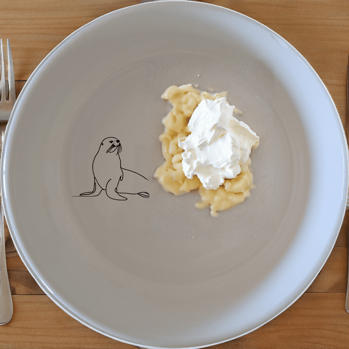 The Cape Fur Seal Bowl Set of 4 features elegant silhouettes on white ceramic, perfect for modern dining and gifting.