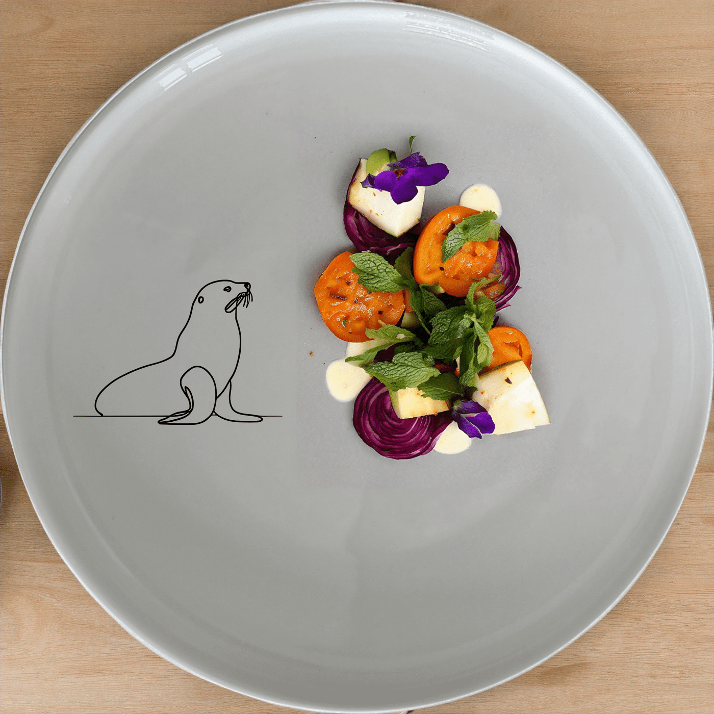 The Cape Fur Seal Dinner Plate Set of 4 features minimalist silhouettes for a modern touch. Perfect for everyday use or special occasions.