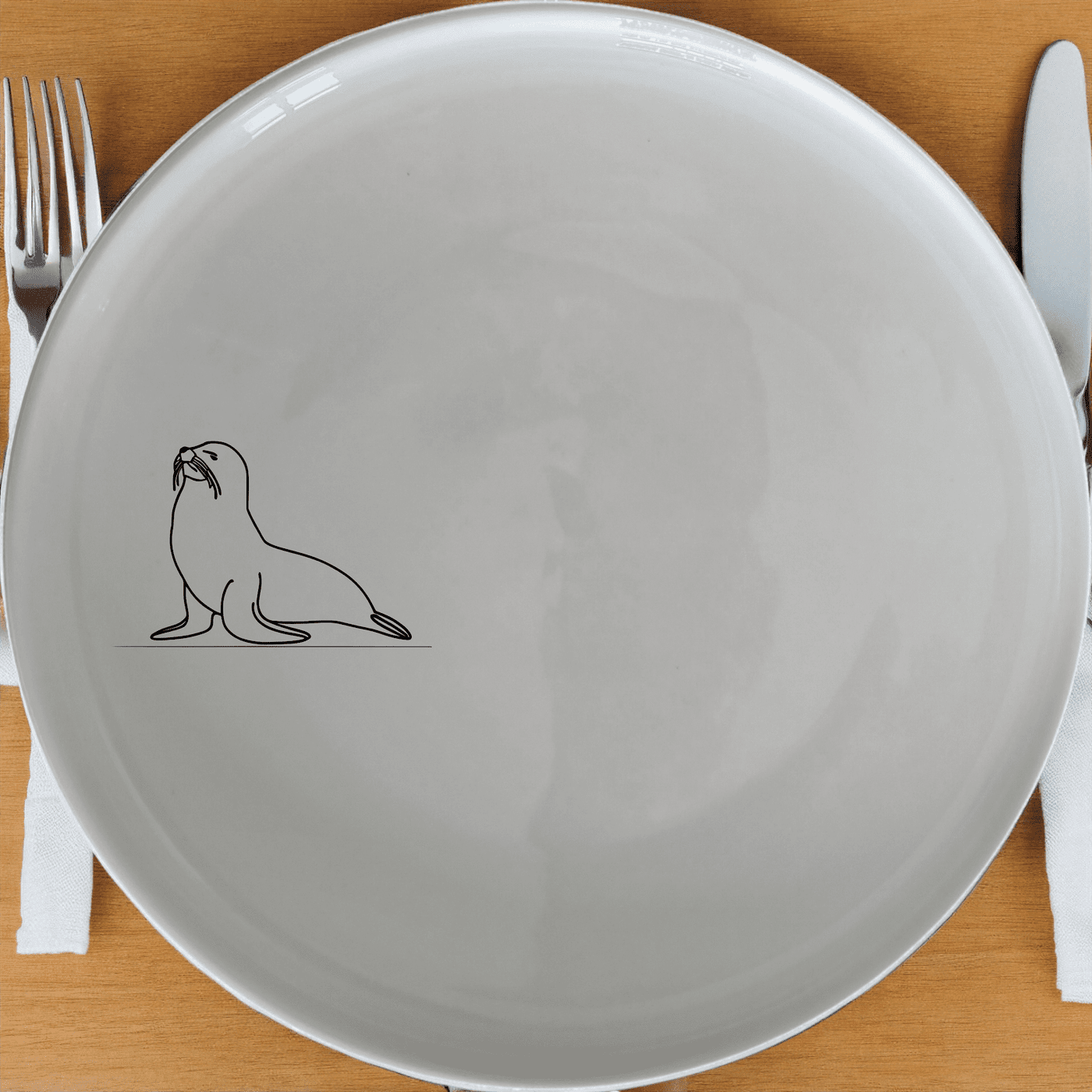 The Cape Fur Seal Side Plate Set of 4 features elegant silhouettes on white ceramic plates, perfect for modern dining.