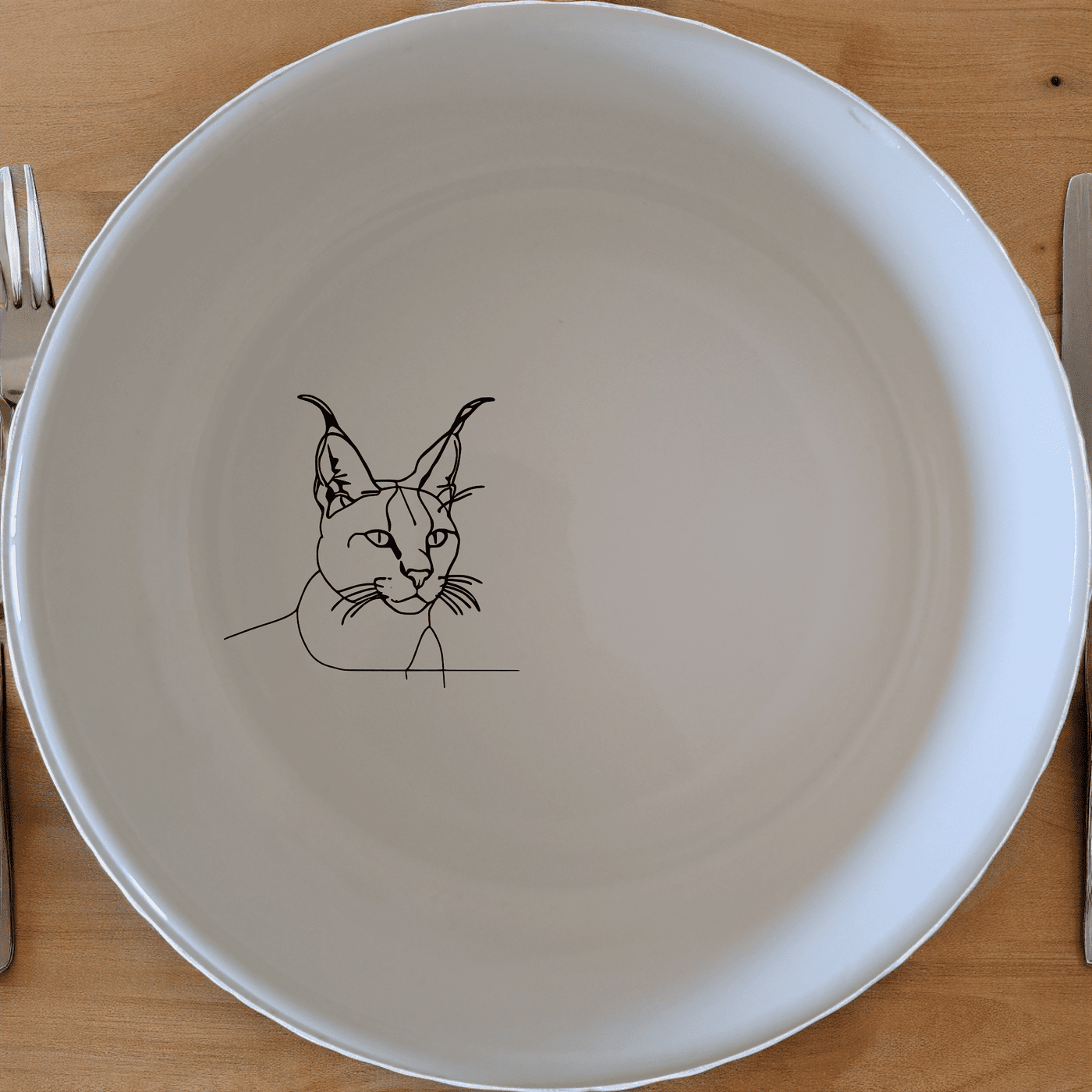 Caracal Ears Tufted Feline Bowl Set of 4 is a stylish and unique addition to any kitchen, featuring elegant feline designs.