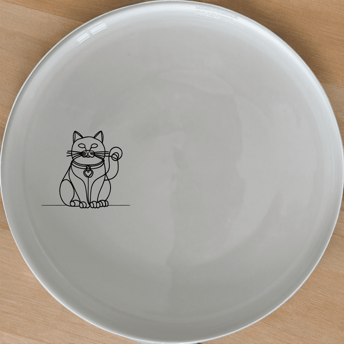 The Chinese Fortune Cat Dinner Plate Set of 4 brings prosperity and good luck to your table. These elegant ceramic plates feature a charming cat design, perfect for everyday use or special occasions.