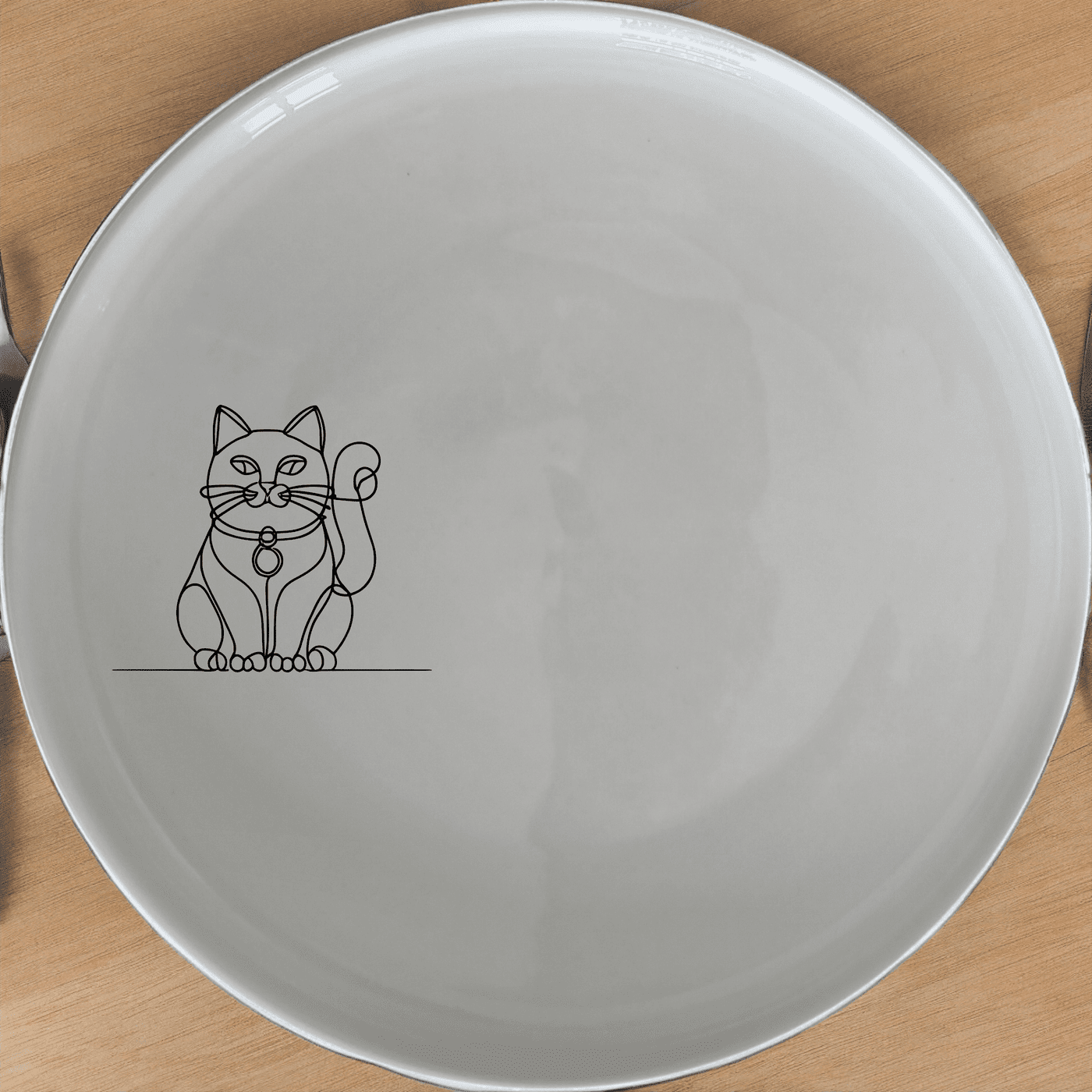 The Chinese Fortune Cat Side Plate Set of 4 - Range 4 brings prosperity and good luck to your table. These elegant ceramic plates feature a traditional design.