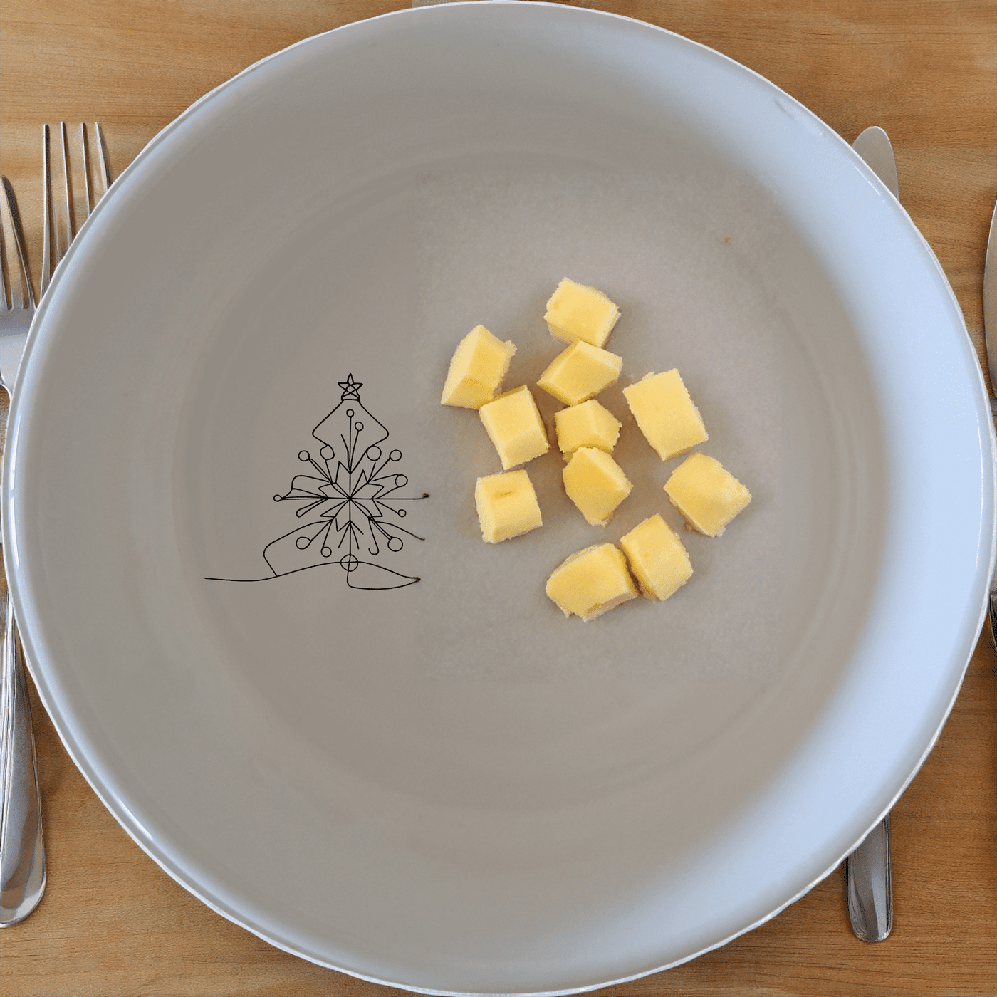 The Christmas Imagery Bowl Set of 4 adds festive charm to your dining table with elegant Christmas designs.