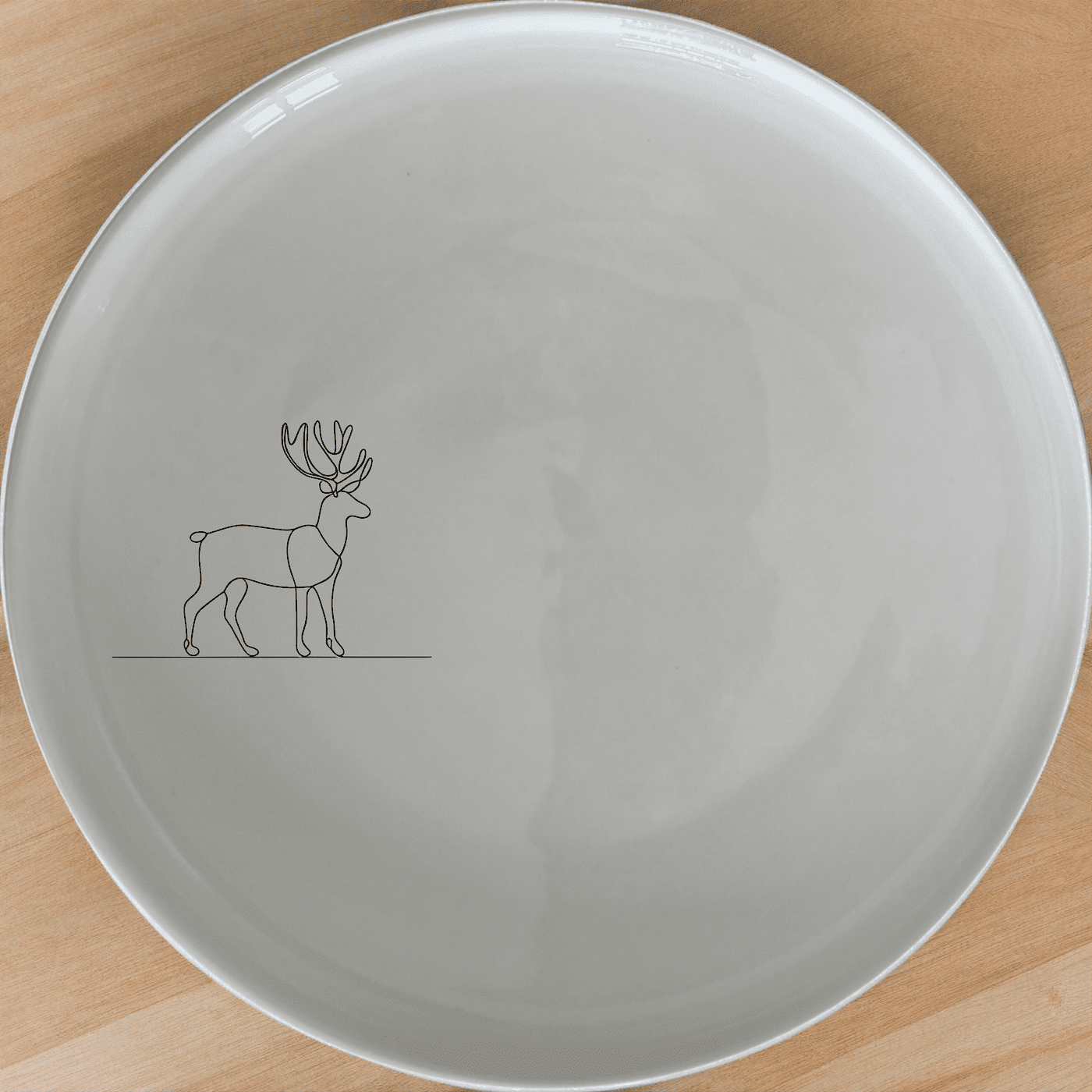 The Deer Silhouette Dinner Plate Set of 4 adds a touch of nature to your dining table with its elegant deer design.