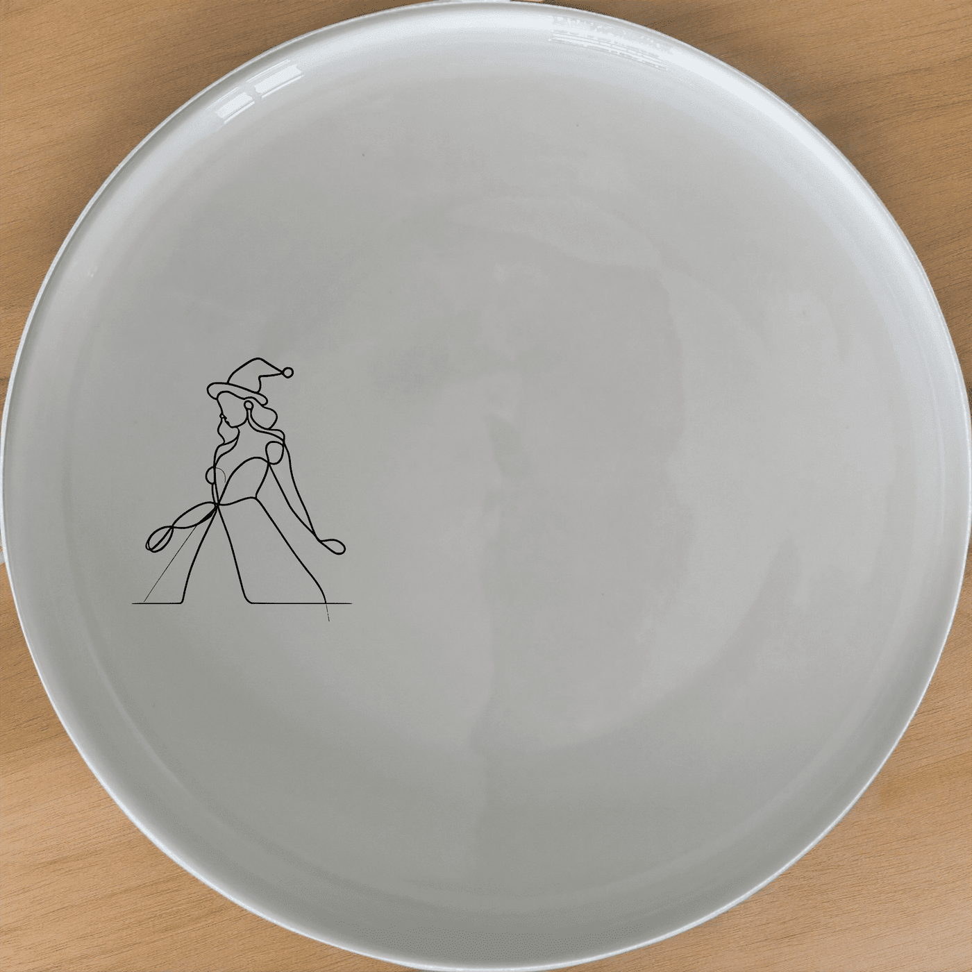 The Christmas Imagery Side Plate Set of 4 features a festive design perfect for holiday gatherings and adds a touch of elegance to your dining table.