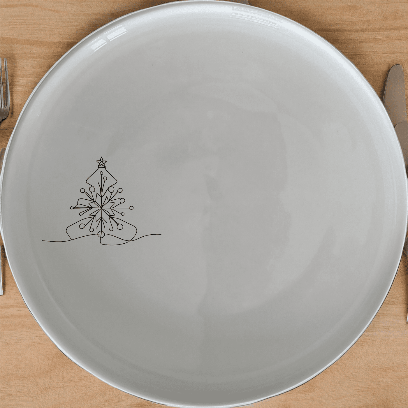 The Christmas Imagery Side Plate Set of 4 features a delicate, minimalist design perfect for festive gatherings and everyday use.