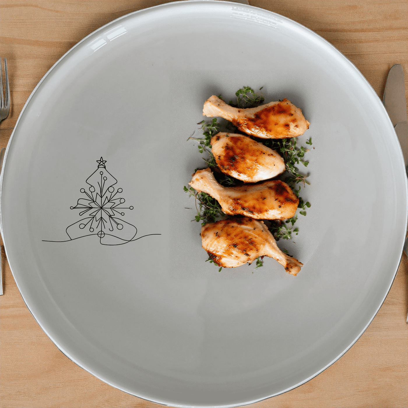 The Christmas Imagery Side Plate Set of 4 features a delicate, minimalist design perfect for festive gatherings and everyday use.