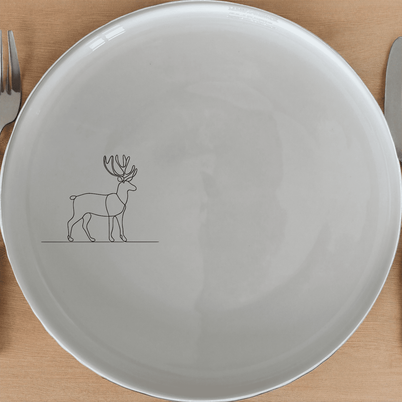 The Deer Silhouette Side Plate Set of 4 adds a touch of nature to your dining table with its elegant, minimalist design.