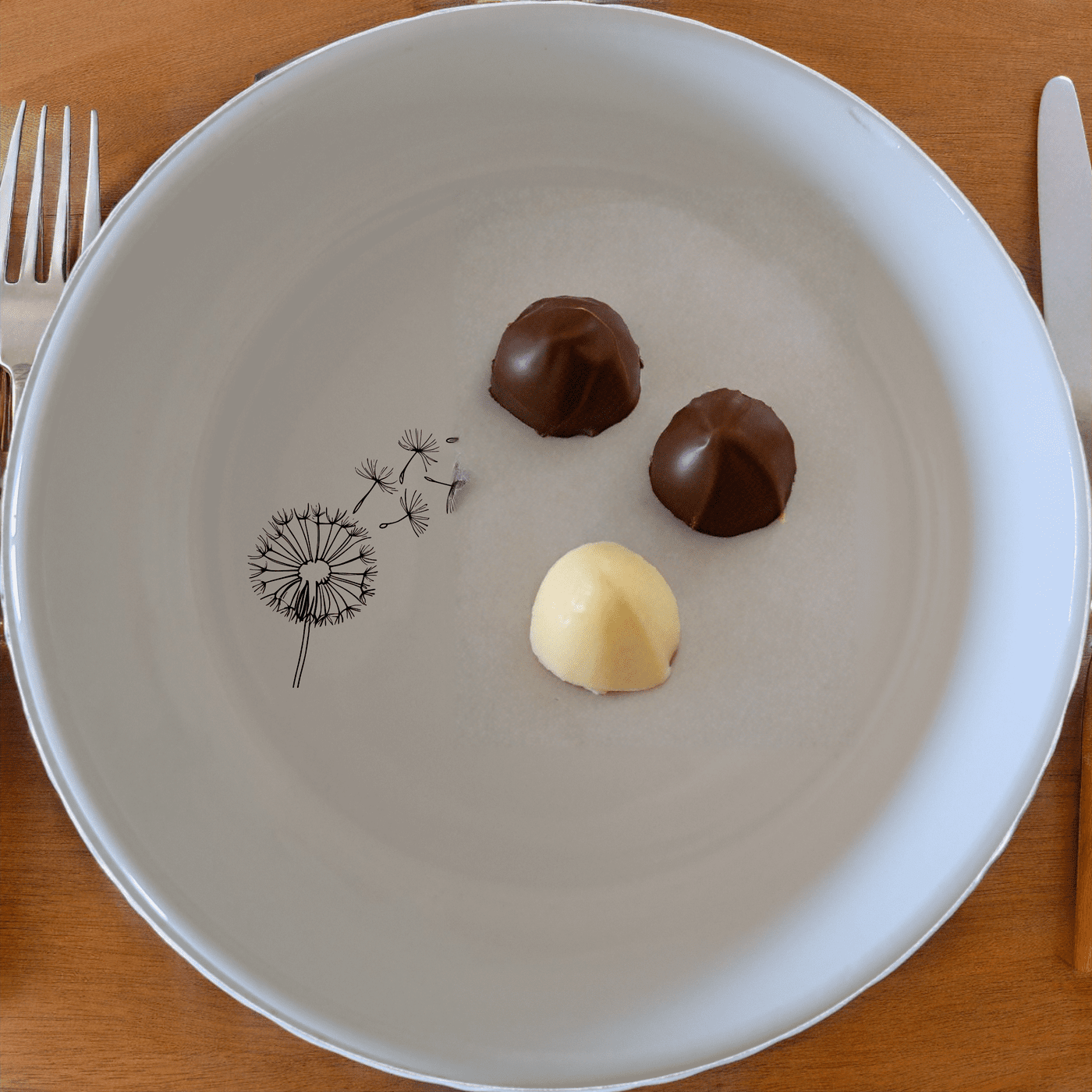 The Dandelion Seeds Wind Bowl Set of 4 features delicate laser-etched designs on white ceramic bowls, perfect for everyday use or special occasions.