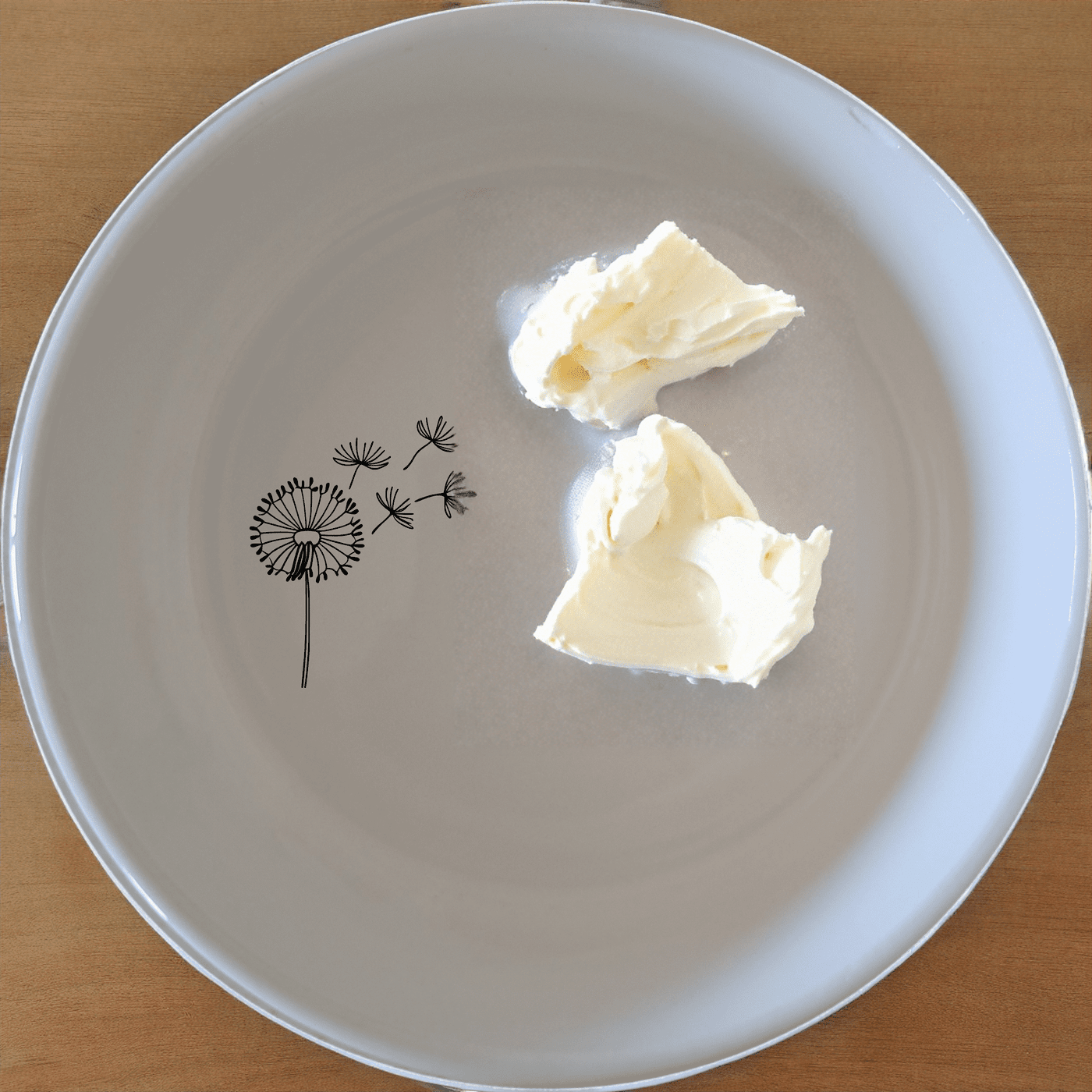 The Dandelion Seeds Wind Bowl Set of 4 features delicate laser-etched designs on white ceramic bowls, perfect for everyday use or special occasions.