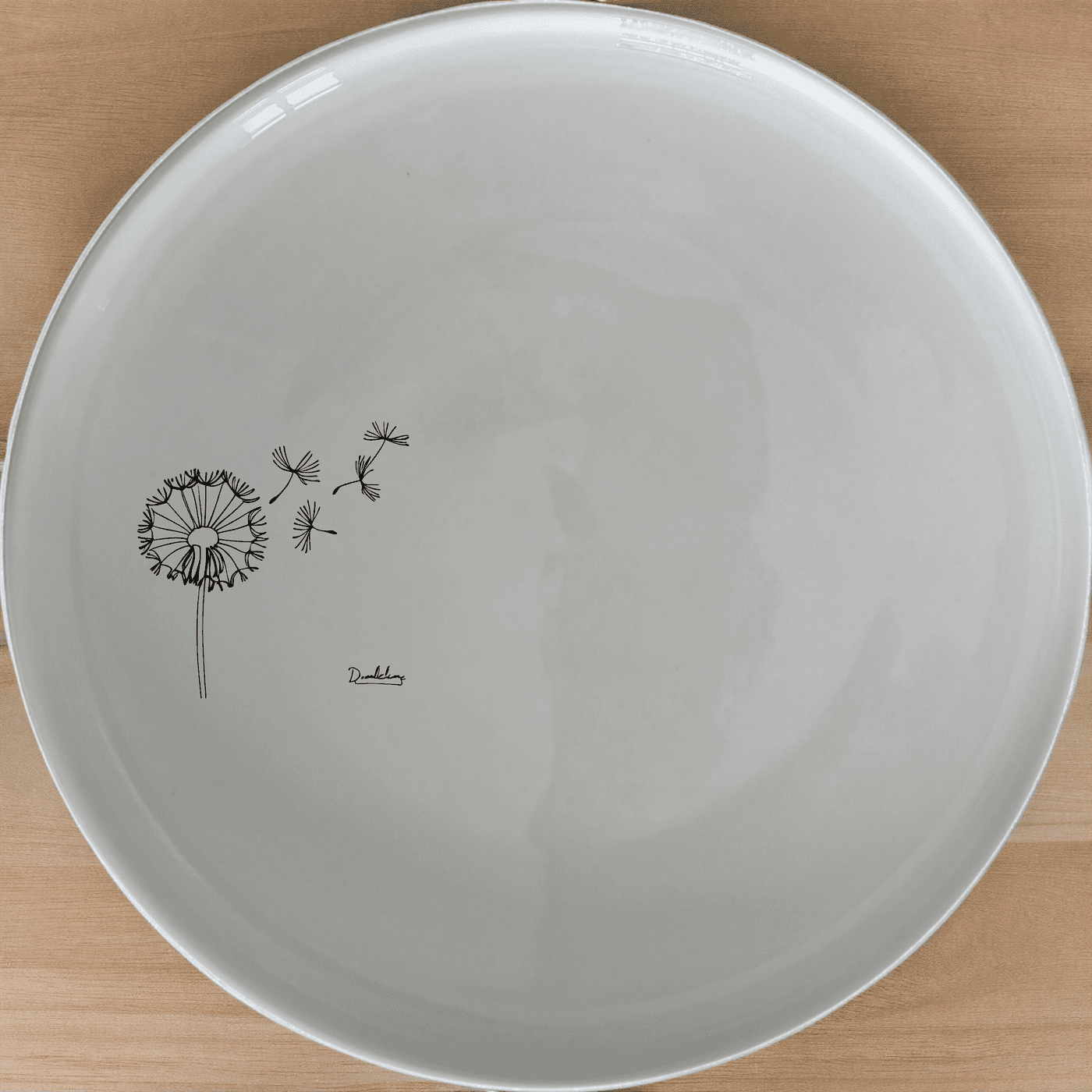 The Dandelion Seeds Wind Dinner Plate Set of 4 features delicate, nature-inspired designs perfect for any dining table.