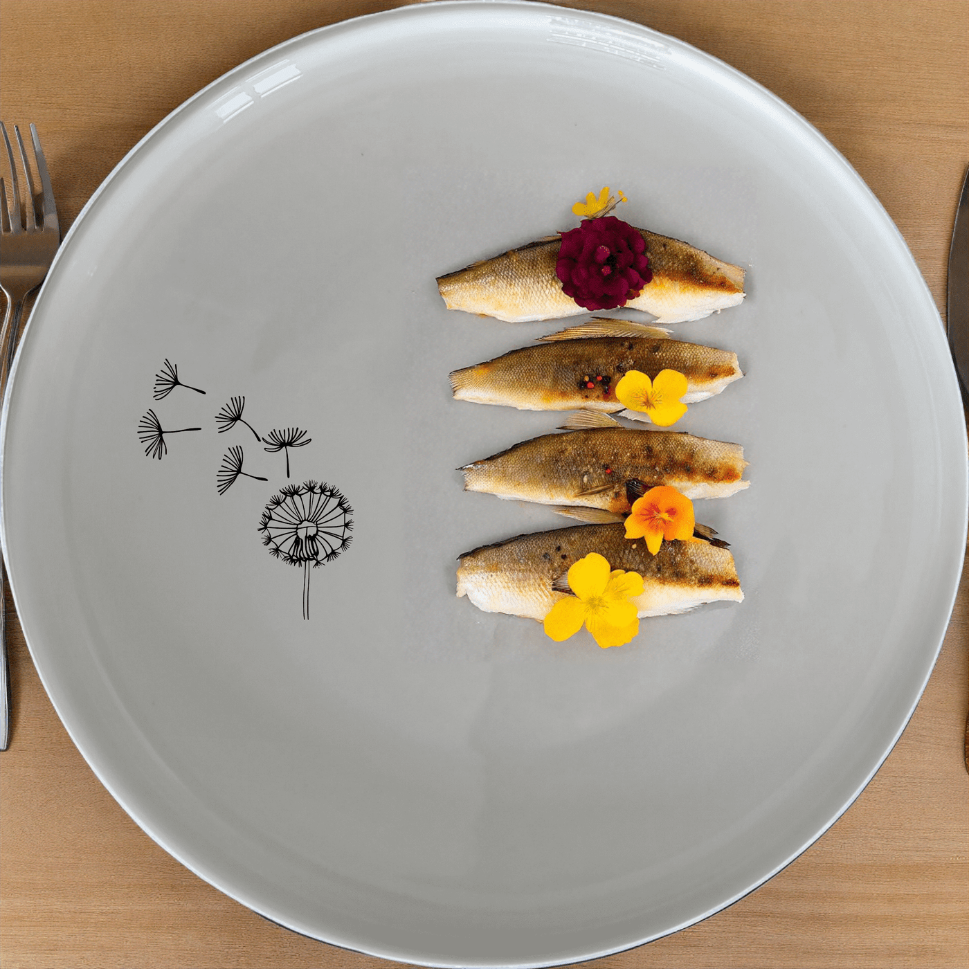 The Dandelion Seeds Wind Dinner Plate Set of 4 features delicate laser-etched designs for a touch of nature-inspired elegance to your dining table.