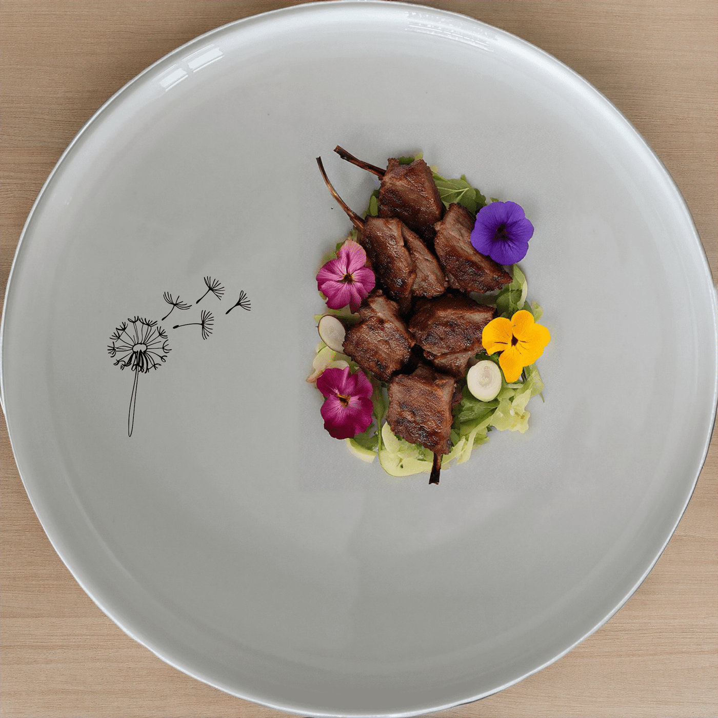 The Dandelion Seeds Dinner Plate Set of 4 features delicate laser-etched designs on white ceramic plates, perfect for everyday elegance and special occasions.