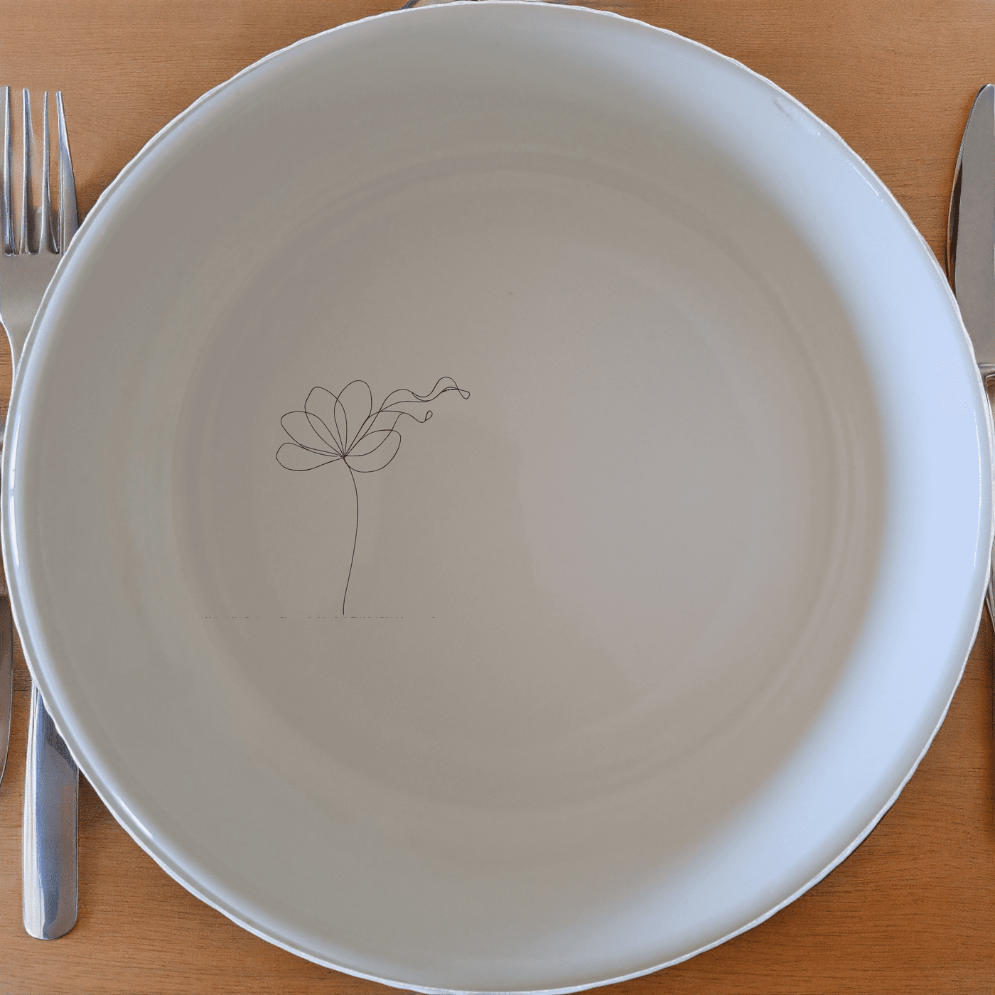 The Delicate Flower Petals Bowl Set of 4 features a minimalist design with subtle floral etchings, perfect for everyday use or special occasions.