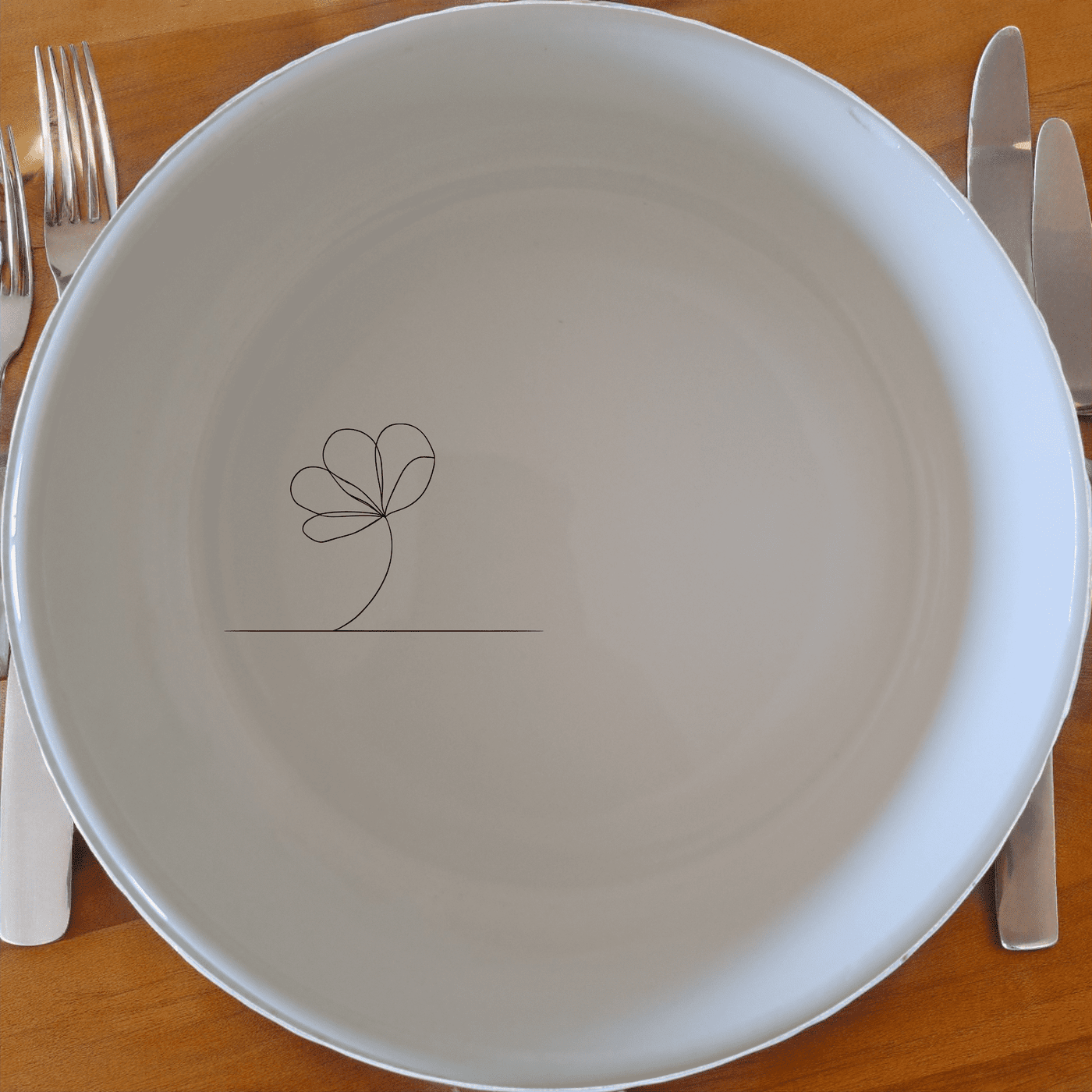 The Delicate Flower Petals Bowl Set of 4 features a minimalist design with subtle floral etching, perfect for everyday use or special occasions.