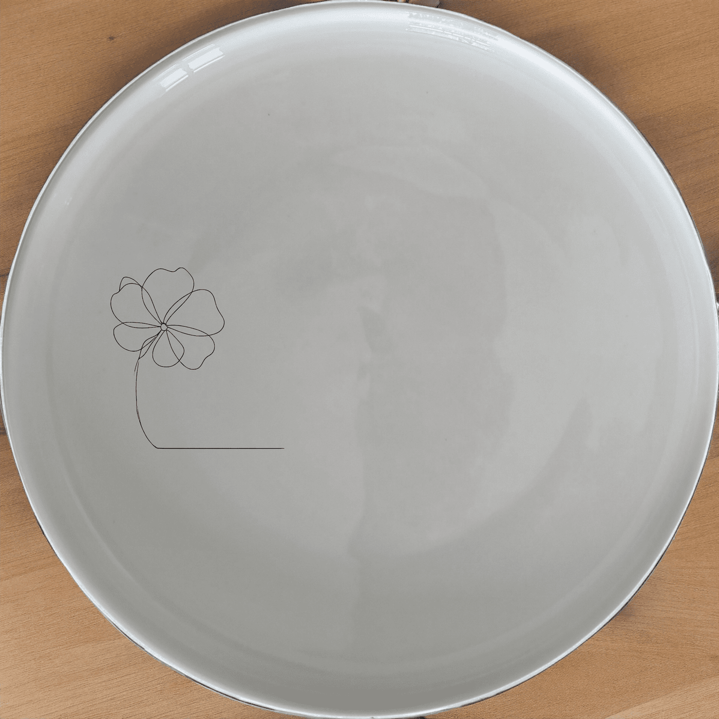 The Delicate Flower Petals Dinner Plate Set of 4 features a subtle, elegant design perfect for any dining occasion.