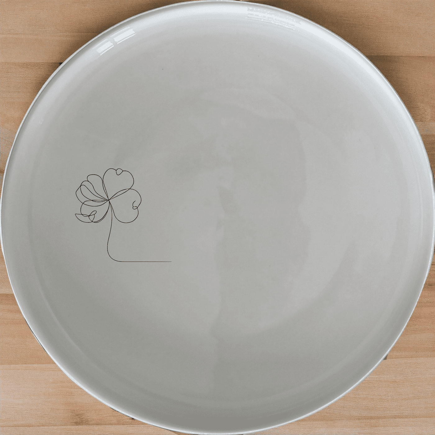 The Delicate Flower Petals Side Plate Set of 4 adds a touch of elegance to your dining table with its intricate design.