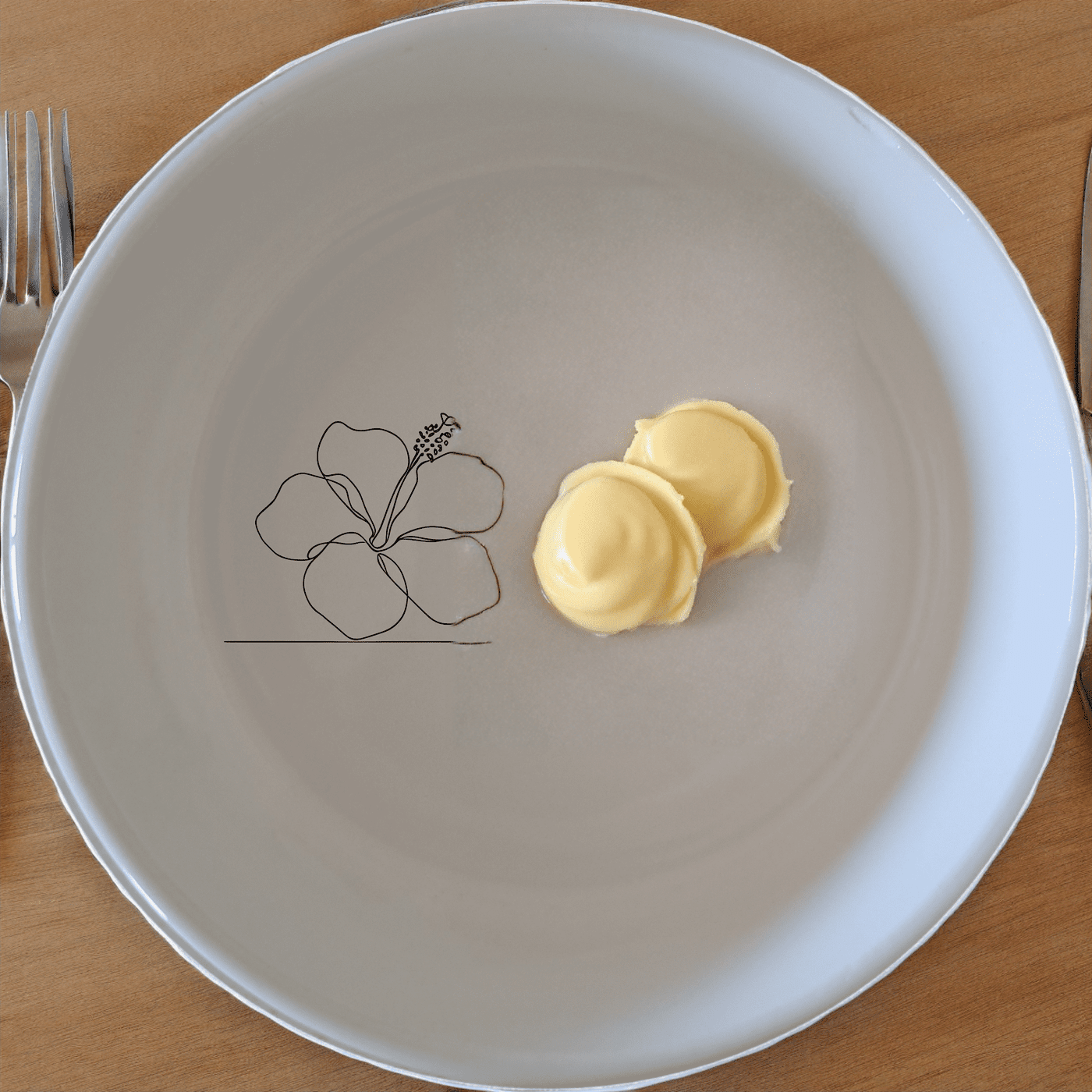 The Delicate Hibiscus Flower Bowl Set of 4 adds a touch of elegance to your dining table with its subtle floral design.