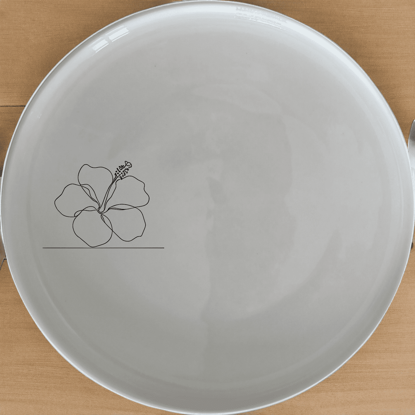 The Delicate Hibiscus Flower Dinner Plate Set of 4 features a subtle and elegant design perfect for any dining occasion.