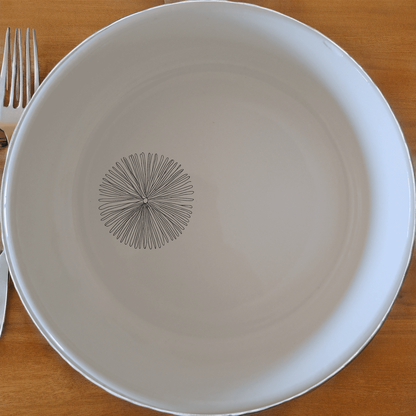 The Delicate Sea Urchins Bowl Set of 4 features intricate sea urchin designs on white ceramic bowls, perfect for any dining occasion.