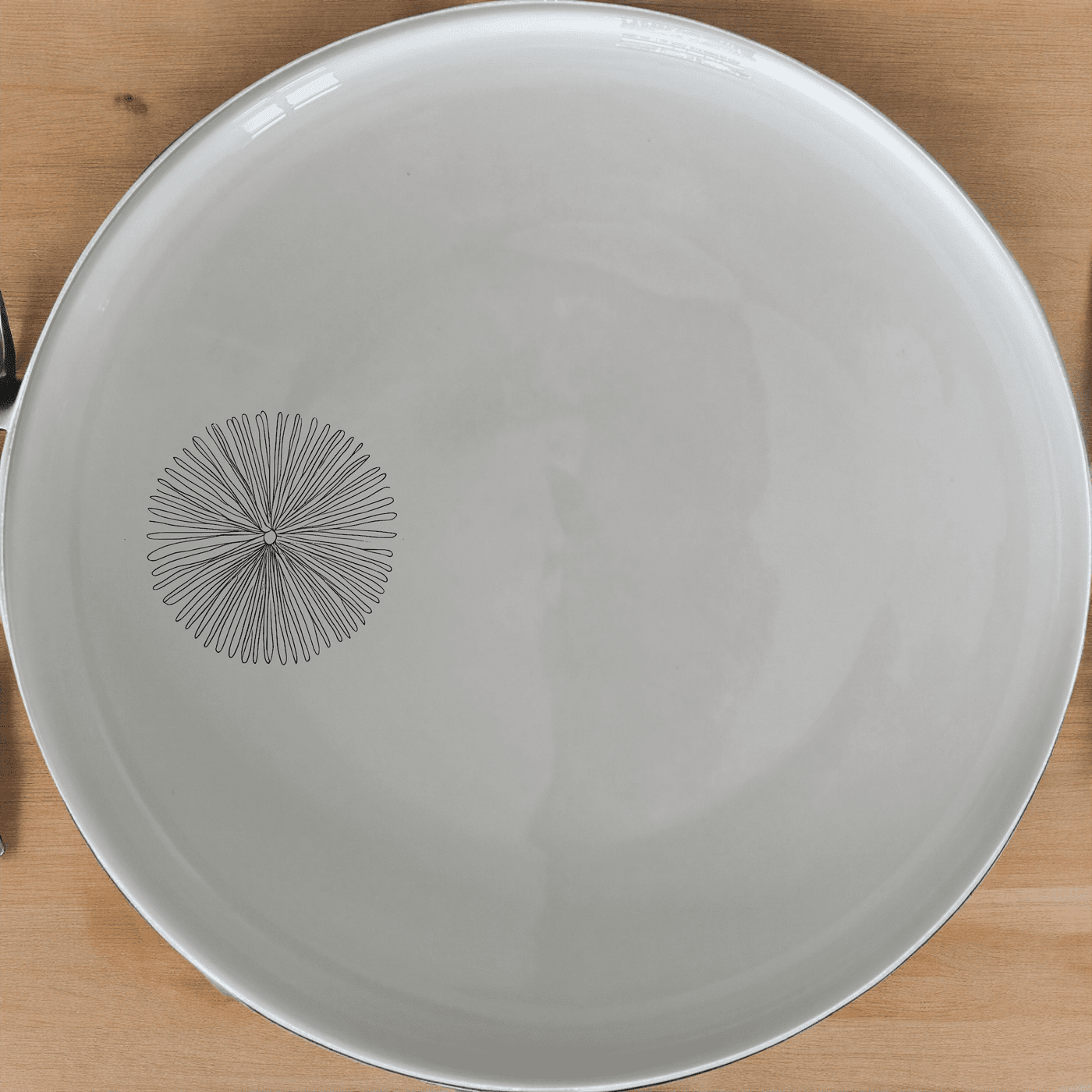 The Delicate Sea Urchins Side Plate Set of 4 features intricate laser-etched designs for a touch of elegance and sophistication in your dining experience.